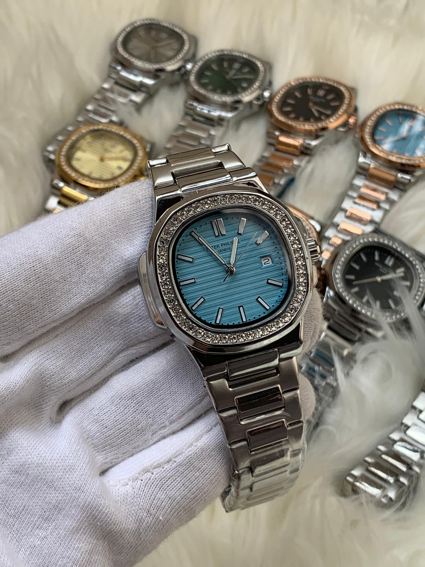 PATEK PHILIPPE- STONE BAZEL NAUTILUS