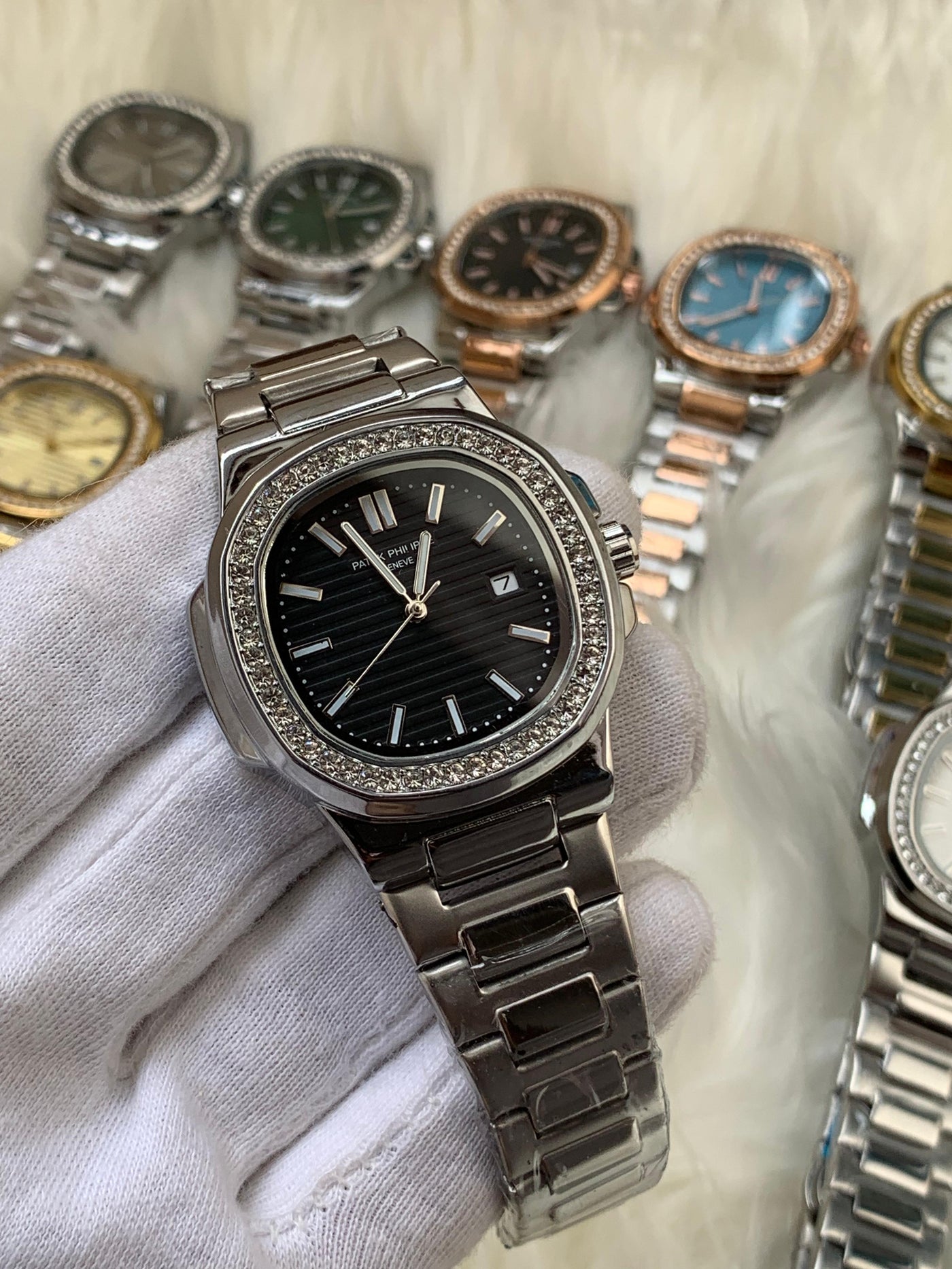 PATEK PHILIPPE- STONE BAZEL NAUTILUS