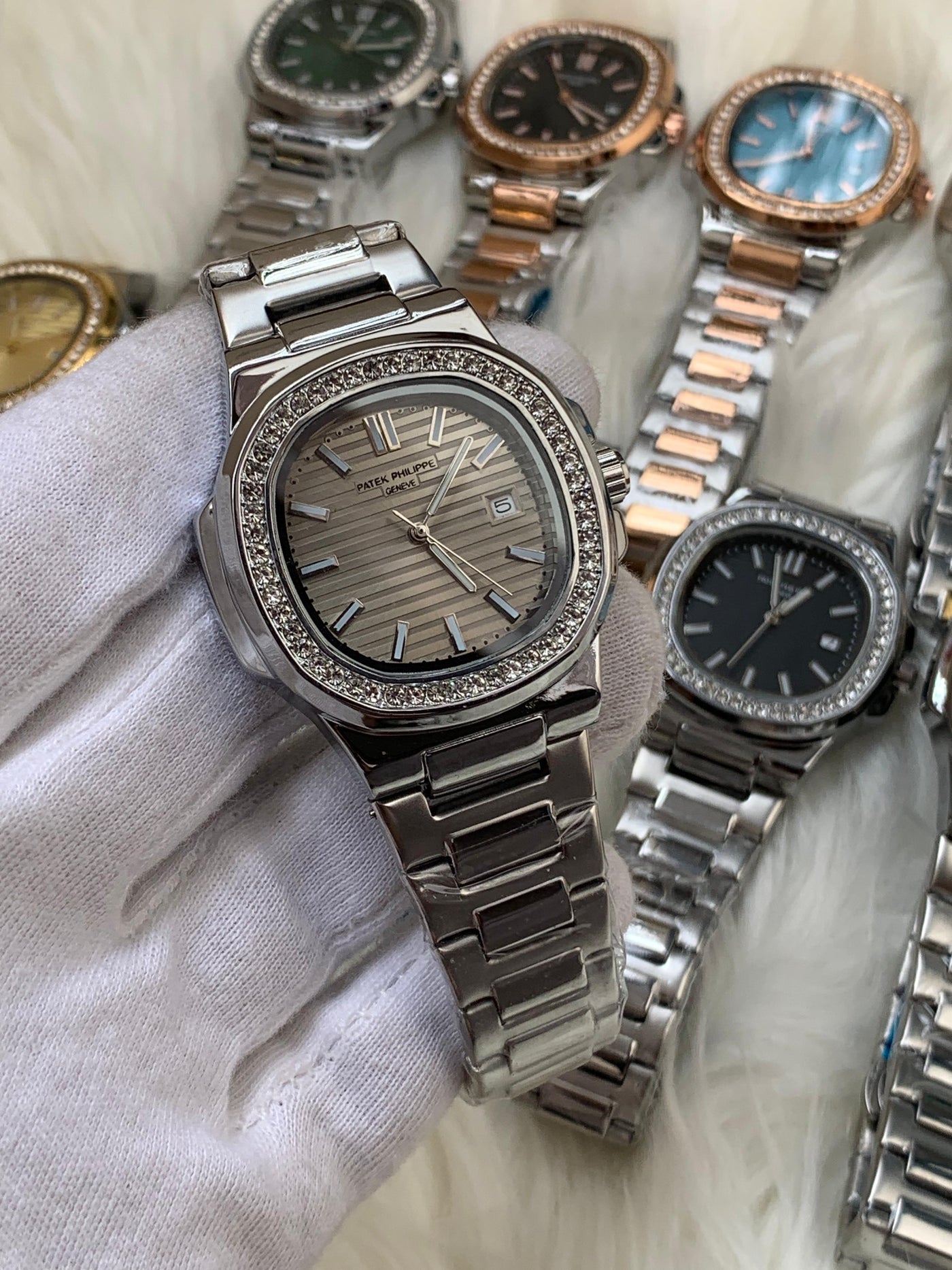 PATEK PHILIPPE- STONE BAZEL NAUTILUS