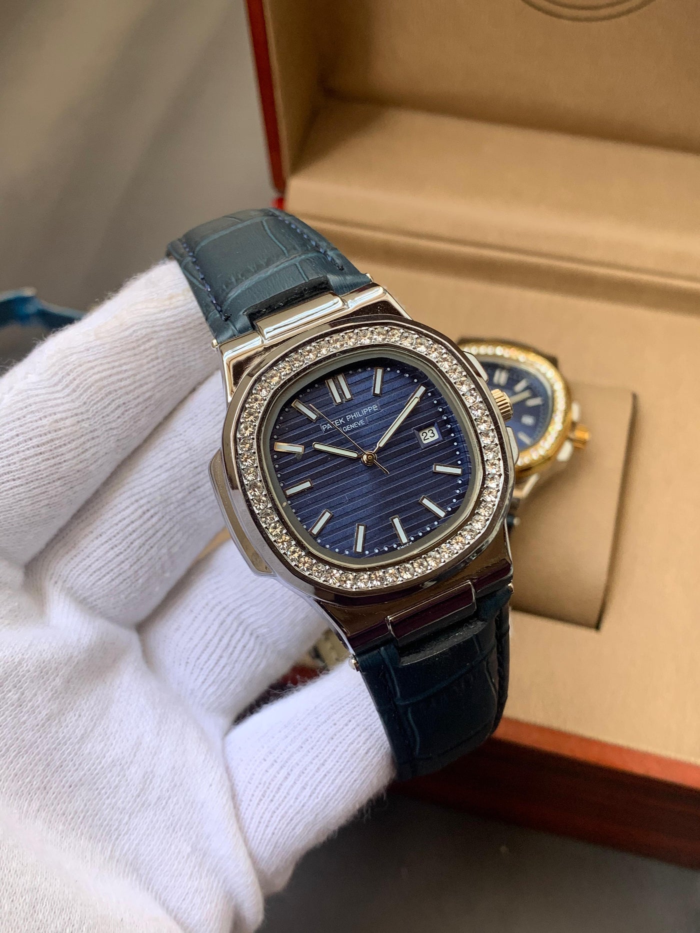 PATEK PHILIPPE- STONE BAZEL NAUTILUS