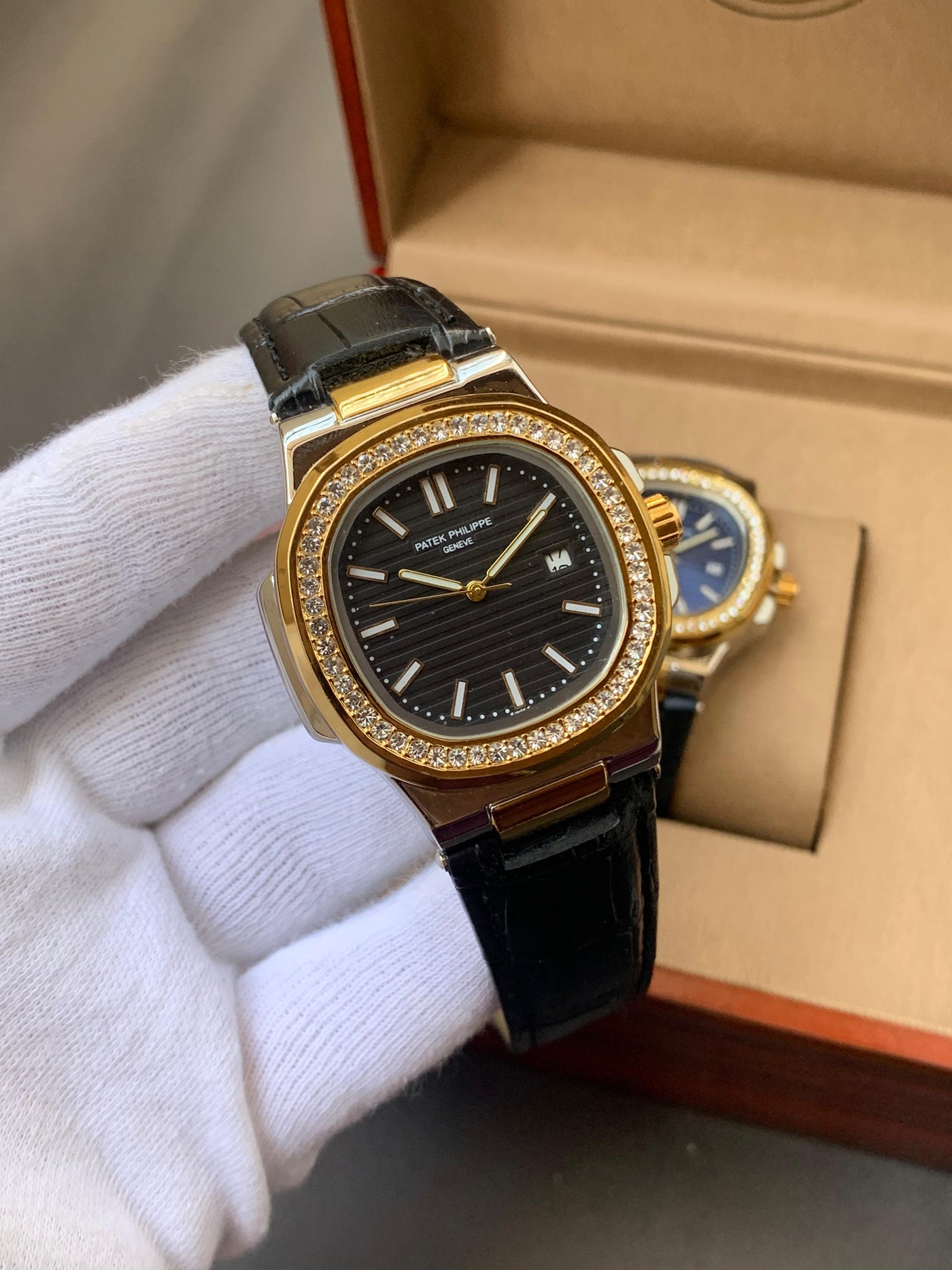 PATEK PHILIPPE- STONE BAZEL NAUTILUS