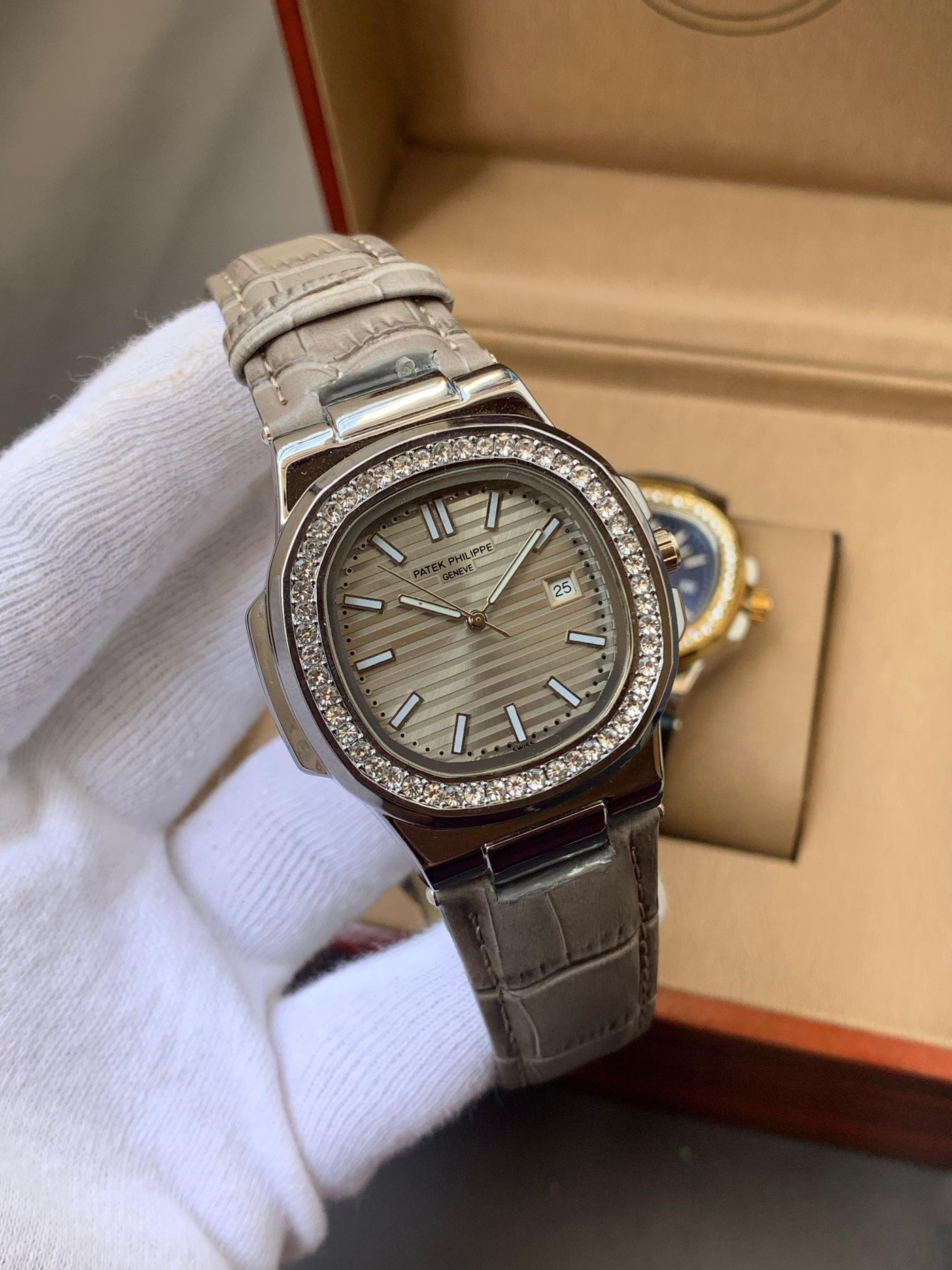 PATEK PHILIPPE- STONE BAZEL NAUTILUS