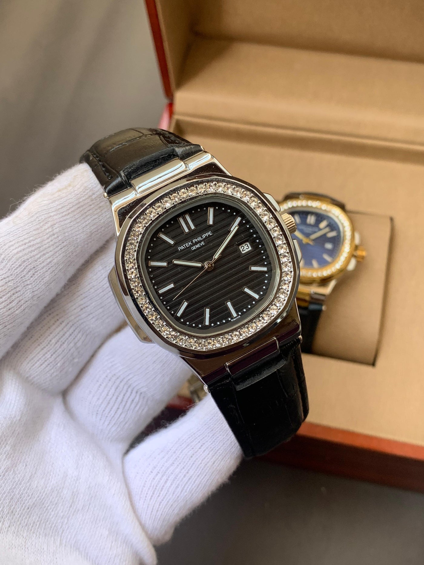PATEK PHILIPPE- STONE BAZEL NAUTILUS